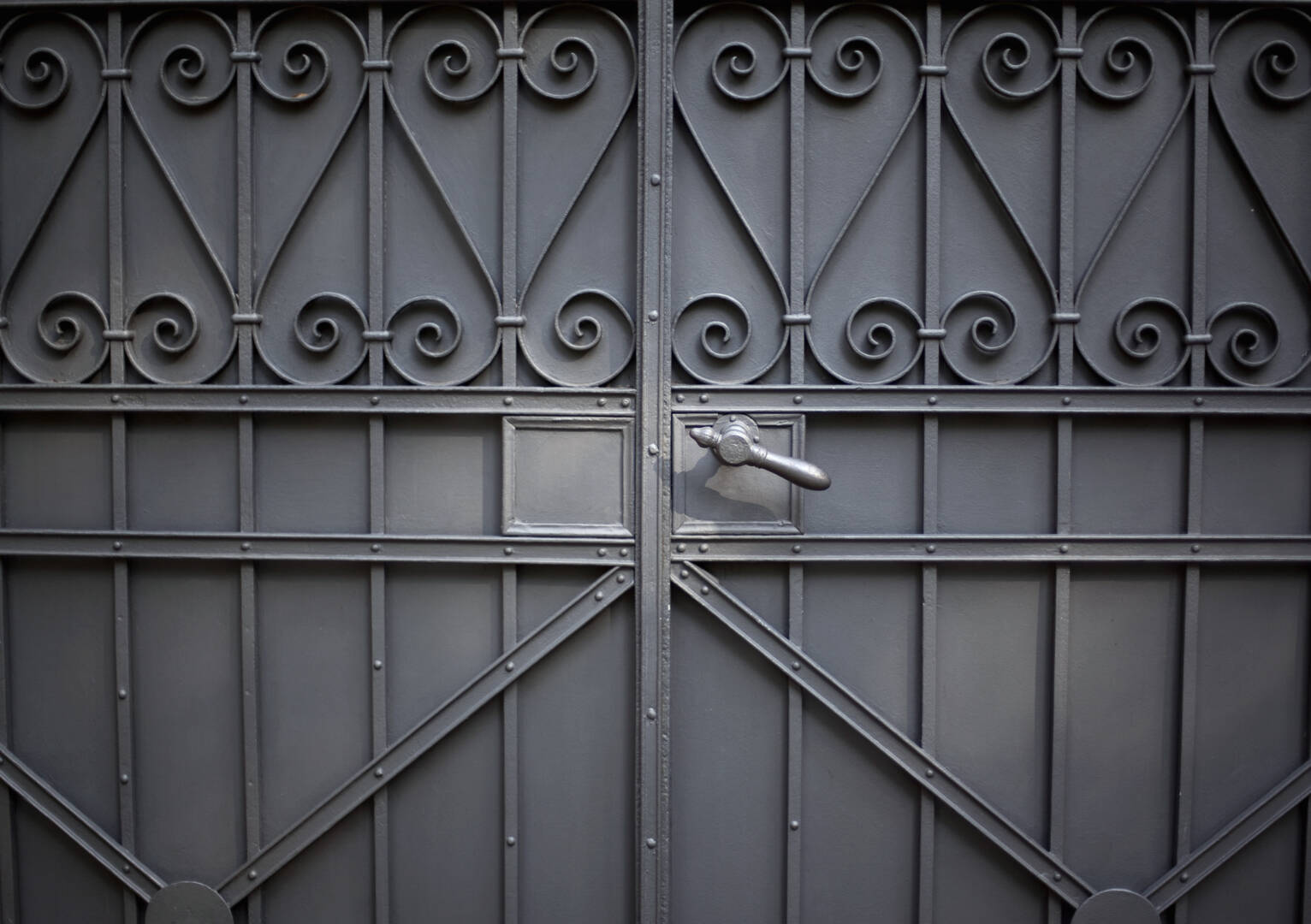 Stylish wrought iron grey gate
