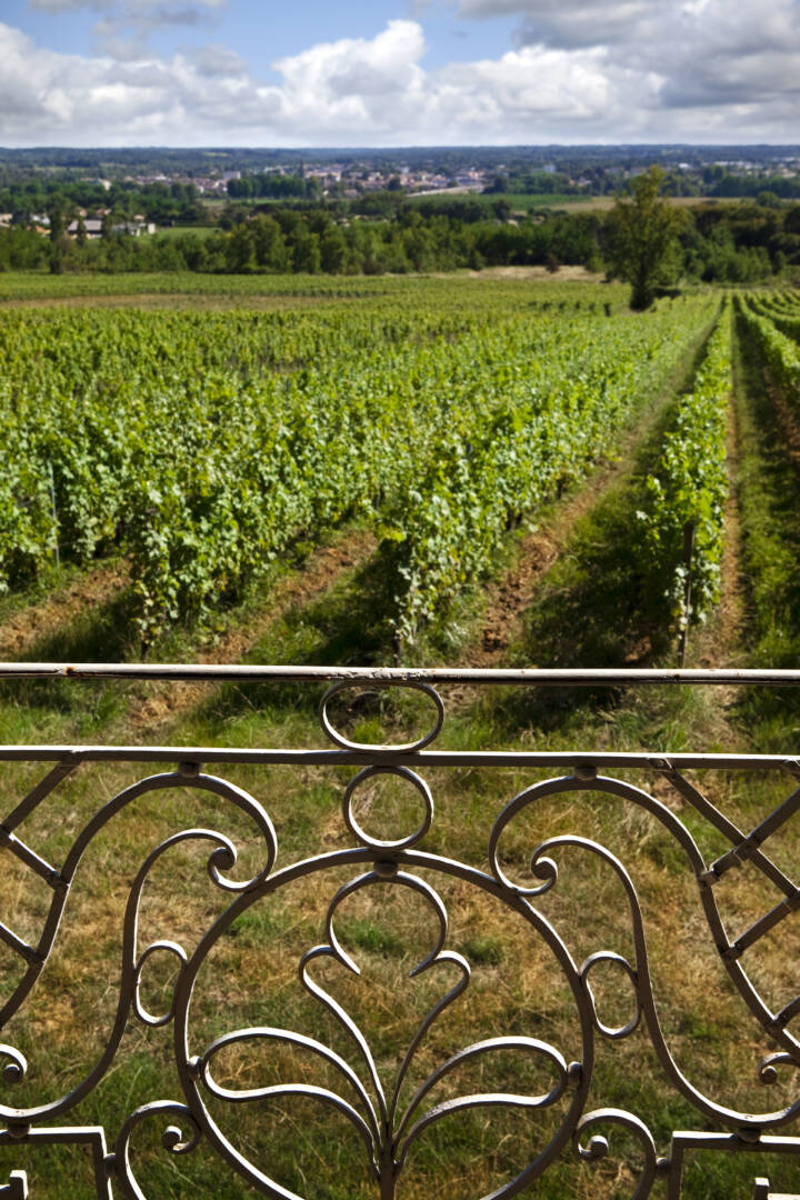 Wrought iron balcony facing French village